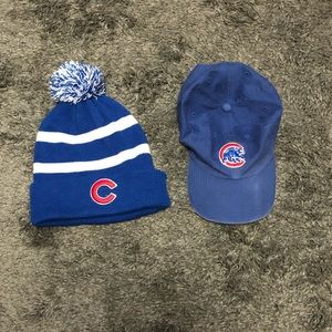 Two Cubs hats
